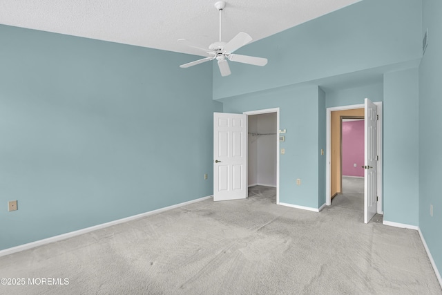 18 Stewart Ct, Jackson, NJ 08527 - unfurnished bedroom featuring carpet floors, a walk in closet, a closet, a ceiling fan, and high vaulted ceiling