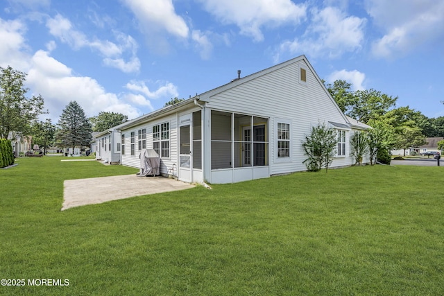 18 Stewart Ct, Jackson, NJ 08527 - back of house featuring a patio, a yard, and a sunroom