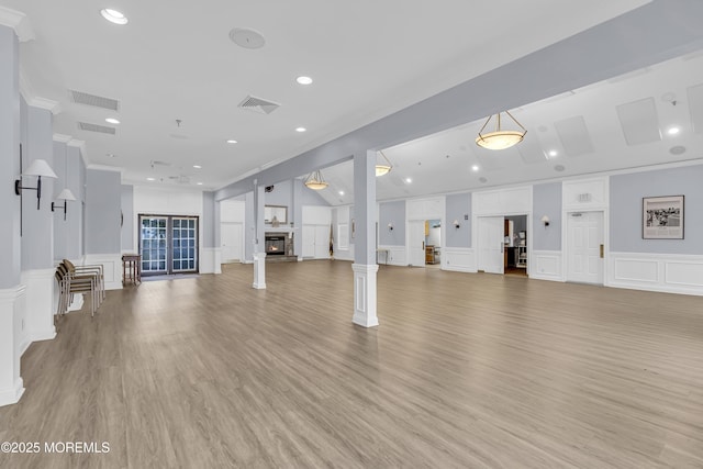 18 Stewart Ct, Jackson, NJ 08527 - unfurnished living room featuring a decorative wall, ornamental molding, recessed lighting, and light wood-style floors