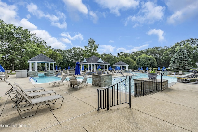 18 Stewart Ct, Jackson, NJ 08527 - community pool featuring a gazebo, view of scattered trees, and a patio