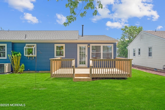 134 Northumberland Dr, Toms River, NJ 08757 - back of property with a deck, a lawn, and a shingled roof