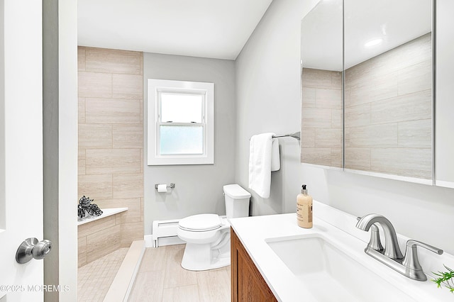 134 Northumberland Dr, Toms River, NJ 08757 - full bath with vanity, baseboard heating, and tiled shower
