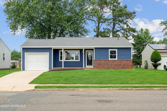 134 Northumberland Dr, Toms River, NJ 08757 - view of front of home featuring an attached garage, concrete driveway, and a front yard
