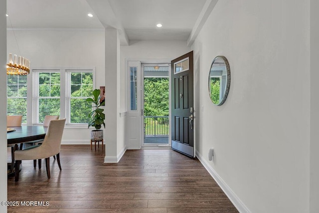 2 Foulks Ter, Lincroft, NJ 07738 - entryway with dark wood-style floors, plenty of natural light, a chandelier, ornamental molding, and recessed lighting
