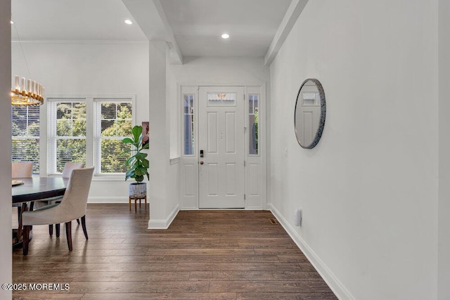 2 Foulks Ter, Lincroft, NJ 07738 - entrance foyer with crown molding, dark wood-style flooring, a chandelier, and recessed lighting