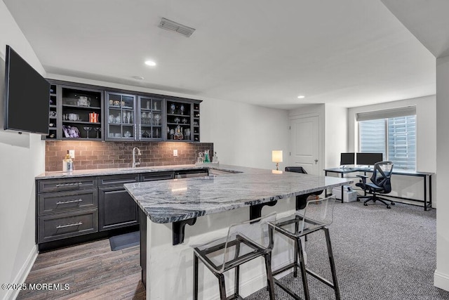 2 Foulks Ter, Lincroft, NJ 07738 - indoor wet bar with tasteful backsplash, recessed lighting, and wood finished floors