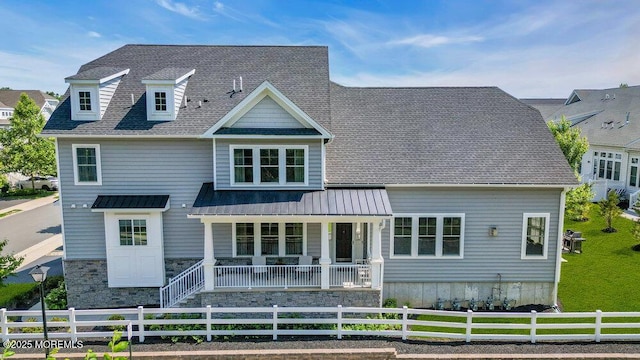 2 Foulks Ter, Lincroft, NJ 07738 - view of front of home featuring covered porch, a fenced front yard, and a shingled roof
