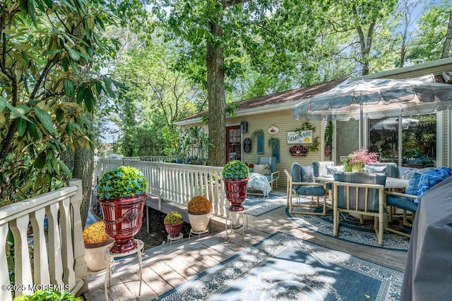 523 Pheasant Ln, Toms River, NJ 08753 - wooden deck featuring outdoor dining area