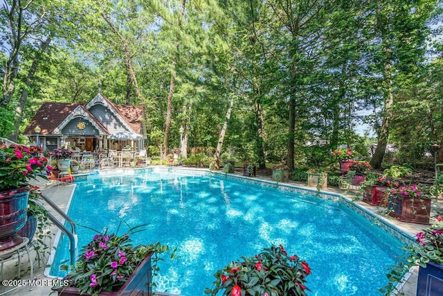 523 Pheasant Ln, Toms River, NJ 08753 - outdoor pool with an outbuilding and an exterior structure