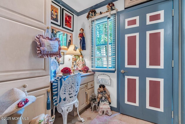 523 Pheasant Ln, Toms River, NJ 08753 - entryway featuring healthy amount of natural light, ornamental molding, and light tile patterned floors