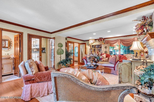 523 Pheasant Ln, Toms River, NJ 08753 - living area featuring crown molding, wood finished floors, recessed lighting, french doors, and a textured ceiling