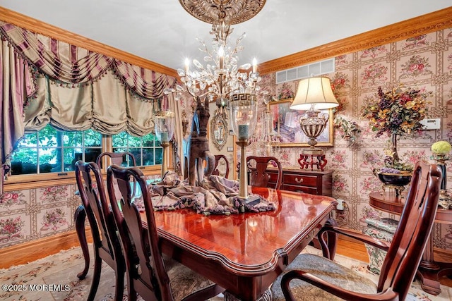 523 Pheasant Ln, Toms River, NJ 08753 - dining area with a chandelier, wood finished floors, and crown molding