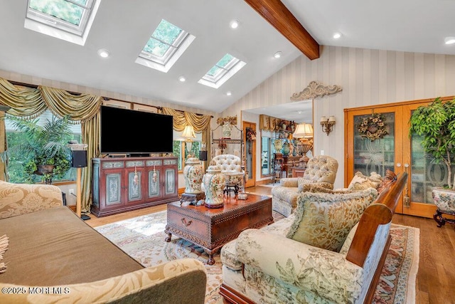 523 Pheasant Ln, Toms River, NJ 08753 - living area featuring wood finished floors, wallpapered walls, a skylight, recessed lighting, and french doors