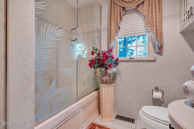 523 Pheasant Ln, Toms River, NJ 08753 - bathroom with enclosed tub / shower combo and tile patterned flooring