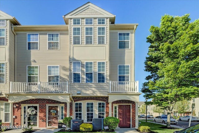 2 Michael Dr, Tinton Falls, NJ 07712 - multi unit property featuring brick siding and a balcony
