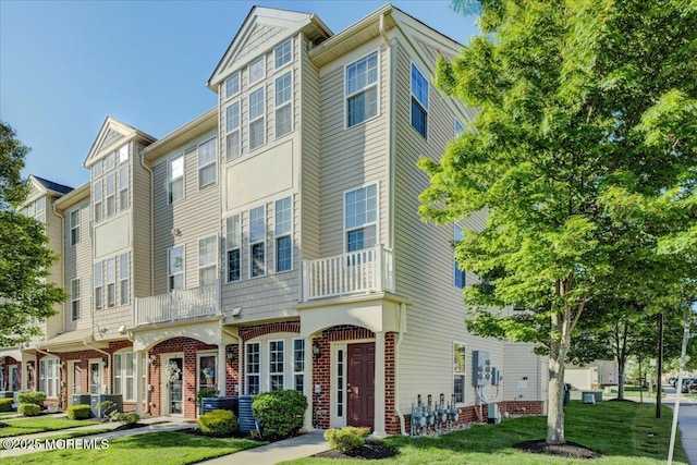 2 Michael Dr, Tinton Falls, NJ 07712 - multi unit property with brick siding and a front lawn