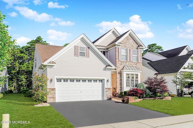 161 Arborridge Dr, Forked River, NJ 08731 - view of front facade with stone siding, driveway, and a front lawn