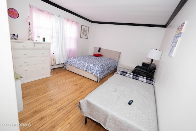 364 Westwood Ave Unit 7, Long Branch, NJ 07740 - bedroom featuring ornamental molding and wood-type flooring