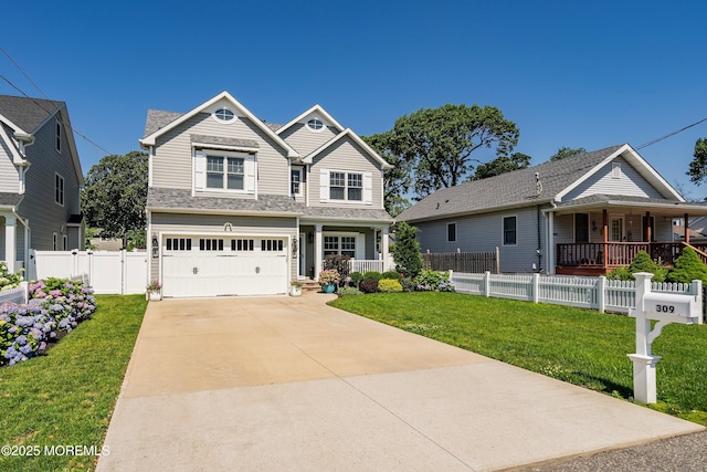 309 Hall Ave, Point Pleasant, NJ 08742 - view of front facade featuring a porch, concrete driveway, and a garage
