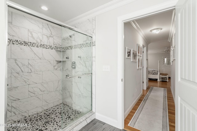 309 Hall Ave, Point Pleasant, NJ 08742 - ensuite bathroom featuring crown molding, wood finished floors, and a shower stall