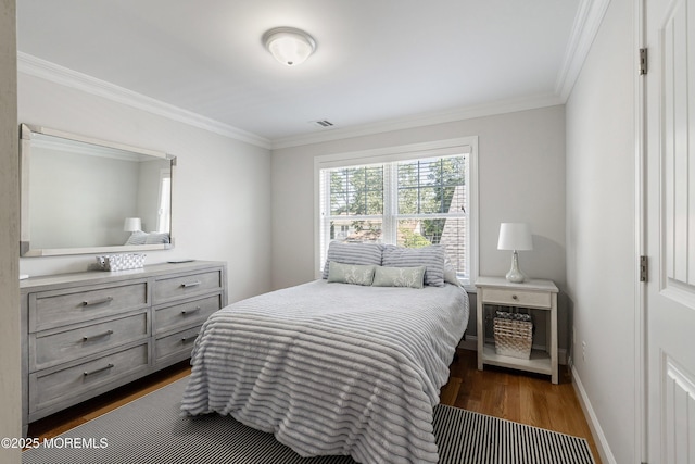 309 Hall Ave, Point Pleasant, NJ 08742 - bedroom featuring dark wood-style flooring and ornamental molding