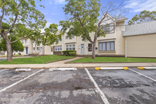 129 Tudor Ct, Lakewood, NJ 08701 - view of property with uncovered parking