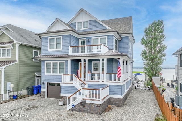 2029 Bay Blvd, Ortley Beach, NJ 08751 - view of front of house featuring a porch, a standing seam roof, roof with shingles, and a metal roof