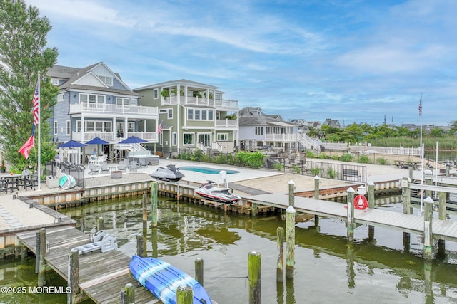 2029 Bay Blvd, Ortley Beach, NJ 08751 - dock area featuring a balcony, a water view, and a patio