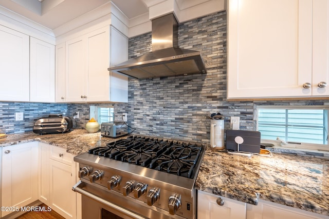 2029 Bay Blvd, Ortley Beach, NJ 08751 - kitchen with high end stainless steel range oven, wall chimney exhaust hood, decorative backsplash, and white cabinetry