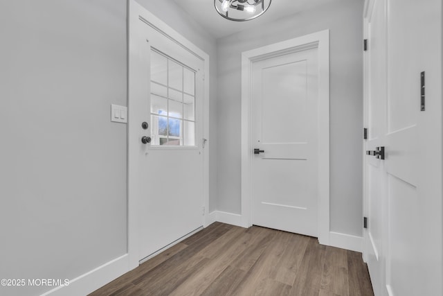 402 Picardy Ct Unit B, Lakewood, NJ 08701 - doorway to outside with baseboards and wood finished floors