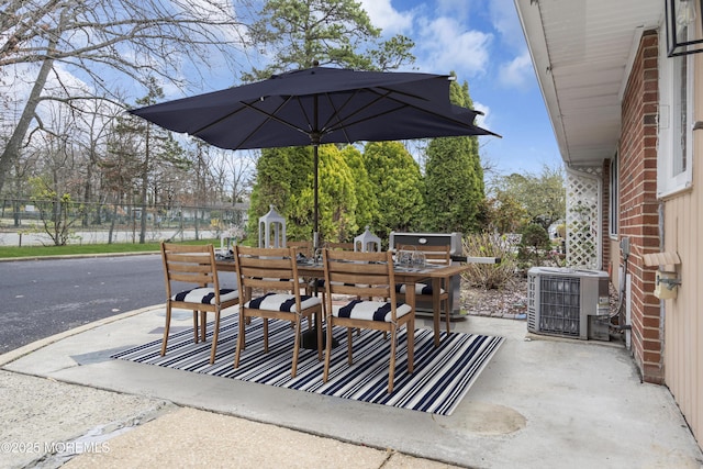 402 Picardy Ct Unit B, Lakewood, NJ 08701 - view of patio featuring outdoor dining area