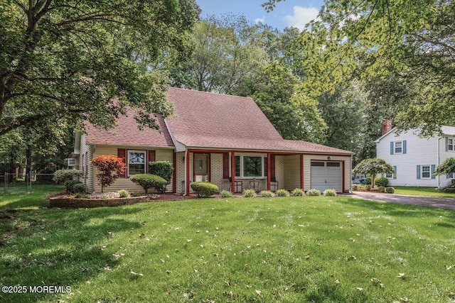 10 Patterson Ln, Manalapan, NJ 07726 - view of front of property with a garage, driveway, covered porch, and roof with shingles