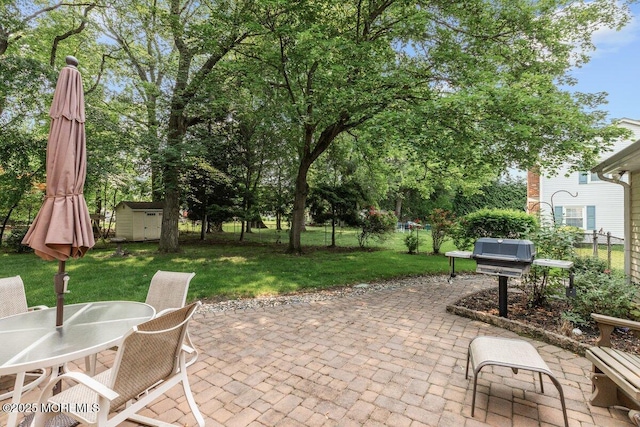 10 Patterson Ln, Manalapan, NJ 07726 - view of patio with a storage unit and outdoor dining space