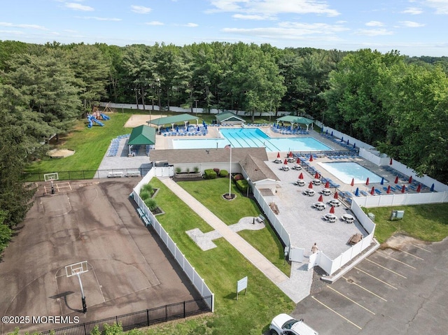 10 Patterson Ln, Manalapan, NJ 07726 - bird's eye view of a pool area and a forest