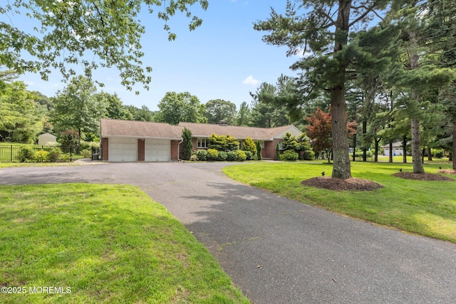 41 Van Brackle Rd, Holmdel, NJ 07733 - ranch-style home with a garage, asphalt driveway, and brick siding