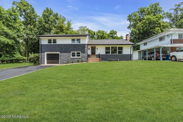 1528 Stuyvesant Ave, Ewing, NJ 08618 - split level home with stone siding, asphalt driveway, an attached garage, a front lawn, and a chimney