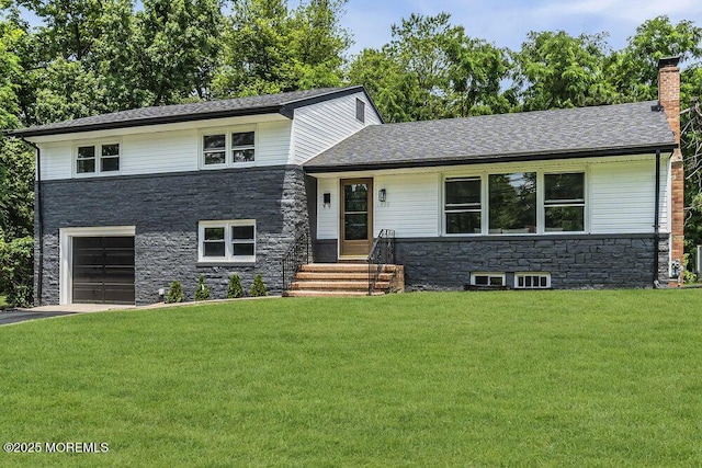 1528 Stuyvesant Ave, Ewing, NJ 08618 - tri-level home with stone siding, a garage, a front yard, and a chimney