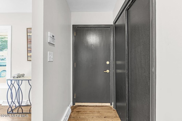 1528 Stuyvesant Ave, Ewing, NJ 08618 - doorway to outside featuring wood finished floors and baseboards