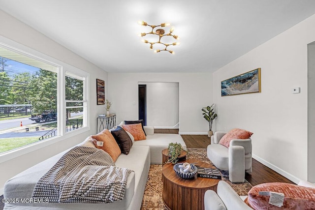 1528 Stuyvesant Ave, Ewing, NJ 08618 - living area with wood finished floors and a chandelier