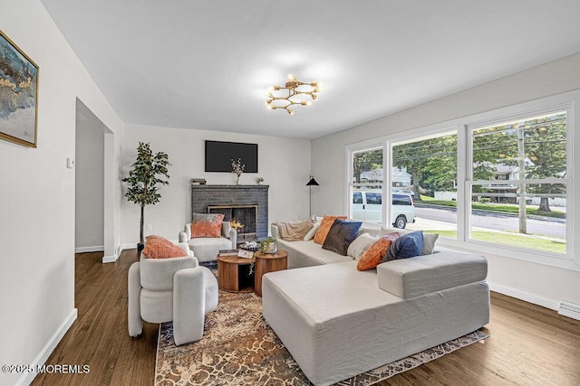 1528 Stuyvesant Ave, Ewing, NJ 08618 - living room with wood finished floors and a fireplace