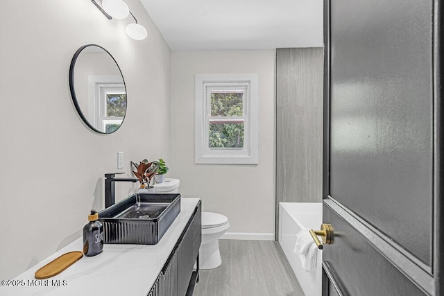 1528 Stuyvesant Ave, Ewing, NJ 08618 - full bathroom featuring vanity, wood finished floors, and bathing tub / shower combination