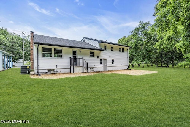 1528 Stuyvesant Ave, Ewing, NJ 08618 - back of house featuring a lawn, a chimney, and a shingled roof
