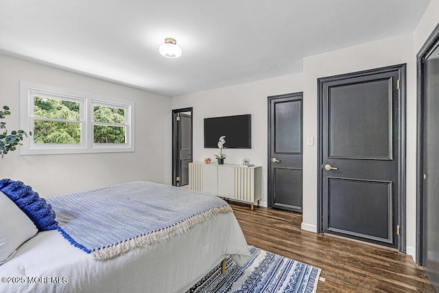 1528 Stuyvesant Ave, Ewing, NJ 08618 - bedroom featuring dark wood-style flooring and baseboards