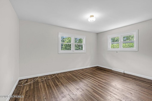 1528 Stuyvesant Ave, Ewing, NJ 08618 - spare room featuring baseboards and wood finished floors