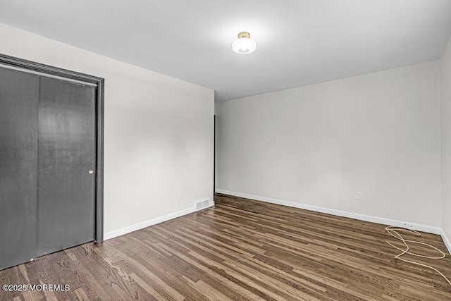 1528 Stuyvesant Ave, Ewing, NJ 08618 - unfurnished bedroom with wood finished floors and baseboards