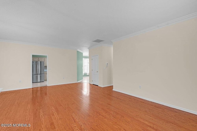 29 Goldenedge Way, Lakewood, NJ 08701 - empty room featuring light wood finished floors and ornamental molding