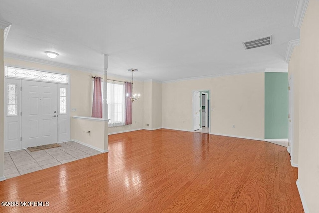 29 Goldenedge Way, Lakewood, NJ 08701 - foyer entrance featuring a chandelier, light wood-type flooring, and crown molding
