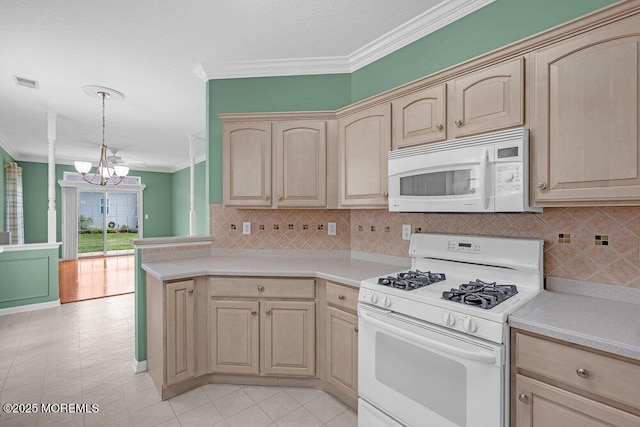 29 Goldenedge Way, Lakewood, NJ 08701 - kitchen featuring white appliances, light brown cabinetry, a chandelier, light countertops, and ornamental molding