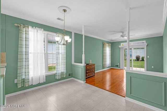 29 Goldenedge Way, Lakewood, NJ 08701 - unfurnished dining area featuring ornamental molding, a ceiling fan, a chandelier, and tile patterned floors