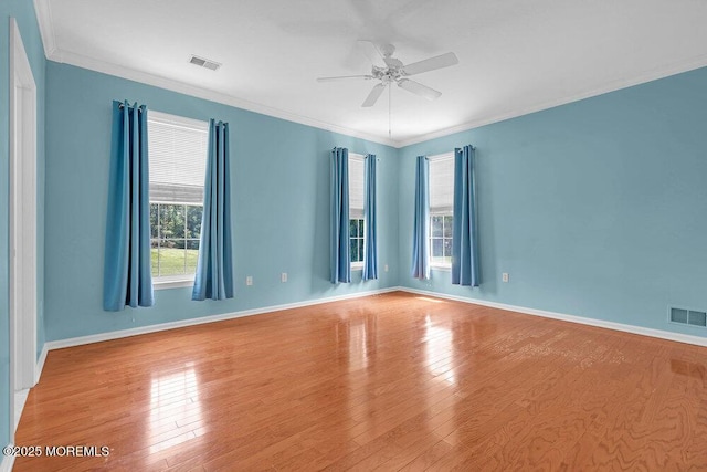 29 Goldenedge Way, Lakewood, NJ 08701 - spare room featuring ceiling fan, wood finished floors, and crown molding